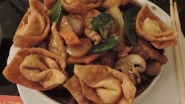 Subgum Wonton · Jumbo shrimp, beef, chicken, roast pork, fried wontons, and mixed vegetables in brown sauce. With white rice.