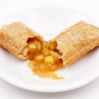 Apple Dumpling · Apples rolled in buttery dough covered in sugar and cinnamon.