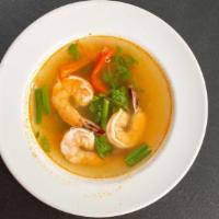 Tom-Yum Goong · Spicy. Shrimp soup with lemon grass and thai chilies.