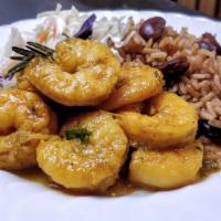 Curry Shrimp With Rice & Beans · Medium to large sized, lightly curried shrimp served on seasoned rice, cooked with kidney be...