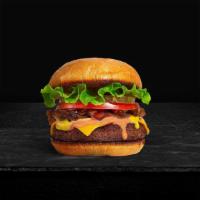 Classic Quirk Burger · American beef patty topped with lettuce, tomato, onion, and pickles. Served on a warm bun.