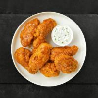 Mango Tango Habanero Wings · Fresh chicken wings breaded, fried until golden brown, and tossed in mango habanero sauce. S...