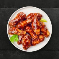 Sizzling Bbq Chicken Wings · Fresh chicken wings breaded, fried until golden brown, and tossed in barbecue sauce. Served ...