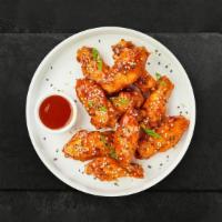 Sweet & Sour Escape Wings · Fresh chicken wings breaded, fried until golden brown, and tossed in sweet and sour sauce. S...