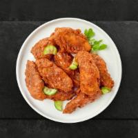 On The Hot Wings · Fresh chicken wings breaded, fried until golden brown, and tossed in Nashville Hot Sauce. Se...