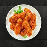 Tender Bbq Sizzlers · Chicken tenders breaded and fried until golden brown before being tossed in barbecue sauce.