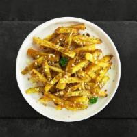 I'M Clovin' It Fries · (Vegetarian) Melted cheese, garlic, cream cheese, and garlic topped on Idaho potato fries.