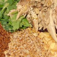Lemon Oregano Chicken Bowl · Baby Kale, Quinoa & Farro Salad, Toasted Almonds, Cranberries, Lemon Oregano Vinaigrette