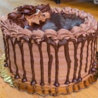 Chocolate Mousse Cake · Chocolate cake with chocolate mouse serves eight to ten slices.