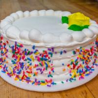 Vanilla Buttercream Cake  · Vanilla cake with vanilla buttercream on the inside and outside serves eight to ten slices