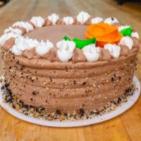Half And Half Chocolate Buttercream Cake · Layer of chocolate cake with a layer of vanilla cake with chocolate buttercream on the insid...