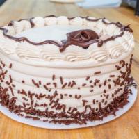 Mocha Buttercream Cake  · Chocolate cake with mocha buttercream on the outside and inside serves eight to ten slices.