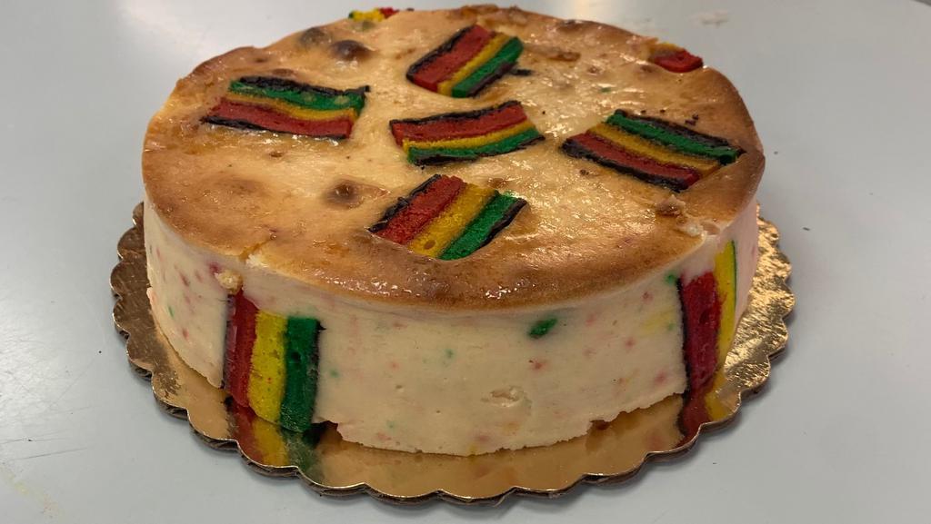Rainbow Cookie Cheesecake  · Plain cheesecake with rainbow cookies inside serves eight to ten slices.