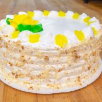 Lemon Buttercream Cake  · Vanilla cake with lemon filling, vanilla buttercream on outside serves eight to ten.