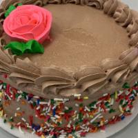 Vanilla With Chocolate Buttercream Cake · Vanilla cake with chocolate buttercream inside and outside serves eight to ten slices.