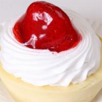 Strawberry Cheesecake · A personal sized plain cheesecake with whip cream, topped with a strawberry dipped in strawb...