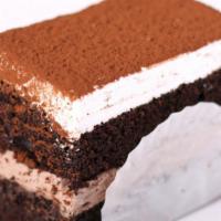 Chocolate Mouse Cake Slice  · Our chocolate cake filled with our famous chocolate mouse cream topped with a layer of whip ...