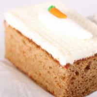 Carrot Cake Slice · Carrot cake with cream cheese frosting cake slice.