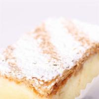 Old Fashion Napoleon · Vanilla cake soaked in a bakers rum filled with our rich vanilla and chocolate custard toppe...