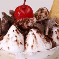 Tiramisu Cup · Our famous tiramisu in a cup, vanilla cake soaked in a bakers rums filled with our delicious...