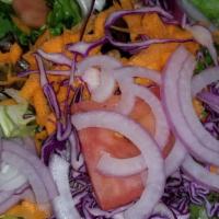 Garden Salad · Fresh greens, tomatoes, cucumbers, carrots, onions, red cabbage and olives. Add grilled chic...