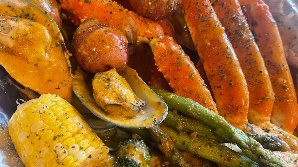 Snow Crab Legs · 1 pound of snow crab legs prepared in our cajun seasoning with 2 corn and 2 potato.
