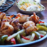 Chicken And Shrimp Fajita  · all fajitas are served with our house guacamole, sour cream, pico de
gallo, cheddar jack che...
