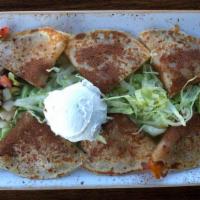 Quesadilla · Masa corn tortilla stuffed with assorted cheeses, pico de gallo, and scallions, served with ...