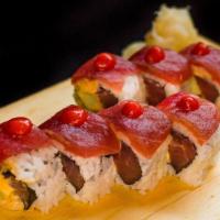 Crazy Tuna Roll · Spicy tuna, cucumber and avocado topped with spicy tuna and chili sauce.