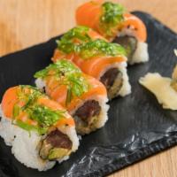 Hot Lava Roll · Spicy tuna avocado topped with spicy salmon and seaweed salad.