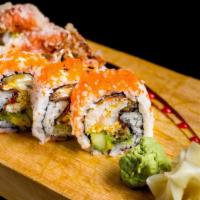 Spider Roll · Fried soft shell crab, cucumber and avocado topped with masago and eel sauce.