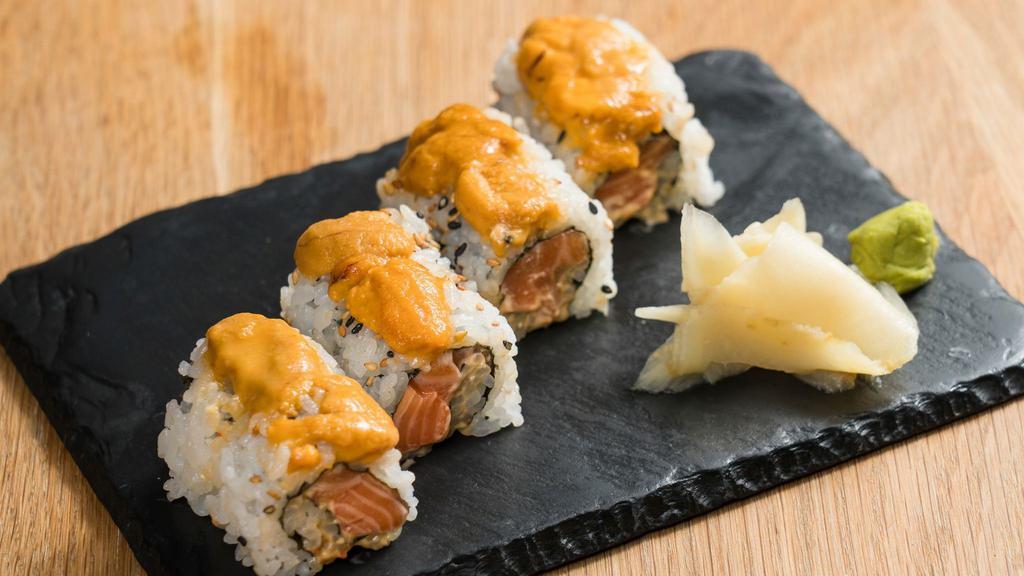 Tiger Roll · Spicy salmon topped with uni.