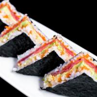 Tuna Sushi Sandwich · Tuna, spicy mayo and avocado inside with triangle-shaped rice topped with seaweed outside.