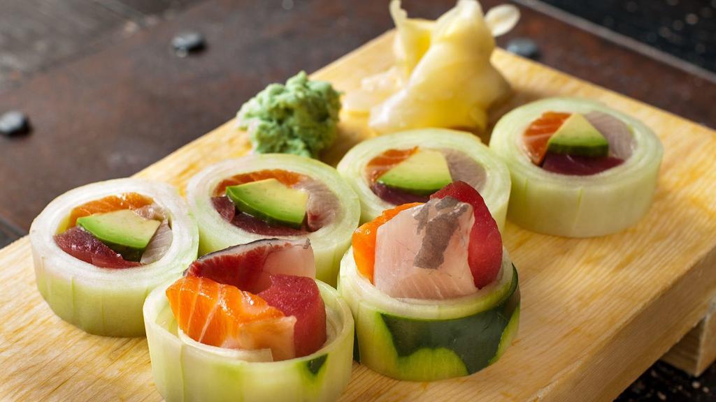 Naruto Roll · Tuna, salmon, yellow tail, and avocado wrapped in cucumber.