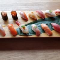 Box F-Omakase Deluxe  · 15 pieces of sushi (madai, akami, king salmon, arctic char, tasmanian trout, red crab, hamac...