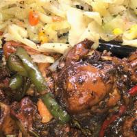 Brown Stew Chicken · brown stew chicken serve with coconut  rice & peas and Steam Cabbage