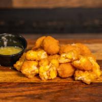 Corn Nuggets · Butter Dipping Sauce

Menu items are cooked to order. Consuming raw or undercooked meat, fis...