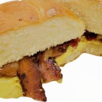Breakfast Sandwich · 2 Eggs, Cheese and a Choice of Meat