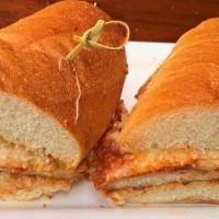 Chicken Parm Sandwich · Fried chicken cutlet topped with mozzarella and tomato sauce, and served on an 8 inch sub roll