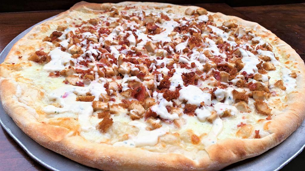 Chicken Bacon Ranch · 18 inch cheese pizza topped with breaded chopped chicken, bacon, and drizzled with ranch