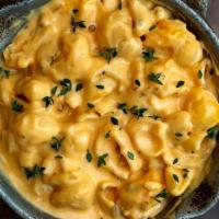 Mac & Cheese · 8 ounces of Southern-style  Mac & Cheese
