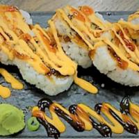 Tempura Shrimp Roll · Tempura shrimp, cucumber, avocado, carrot, spicy sauce, teriyaki