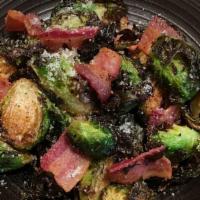 Brussel Sprouts & Bacon · Crsipy brussel sprouts with bacon and parmesan cheese.