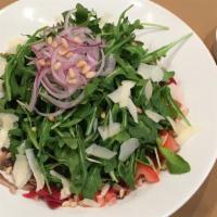 Arugula & Farro Salad · Sauteed mushrooms, red beets, red onions, toasted pine nuts, and parmesan cheese with a bals...
