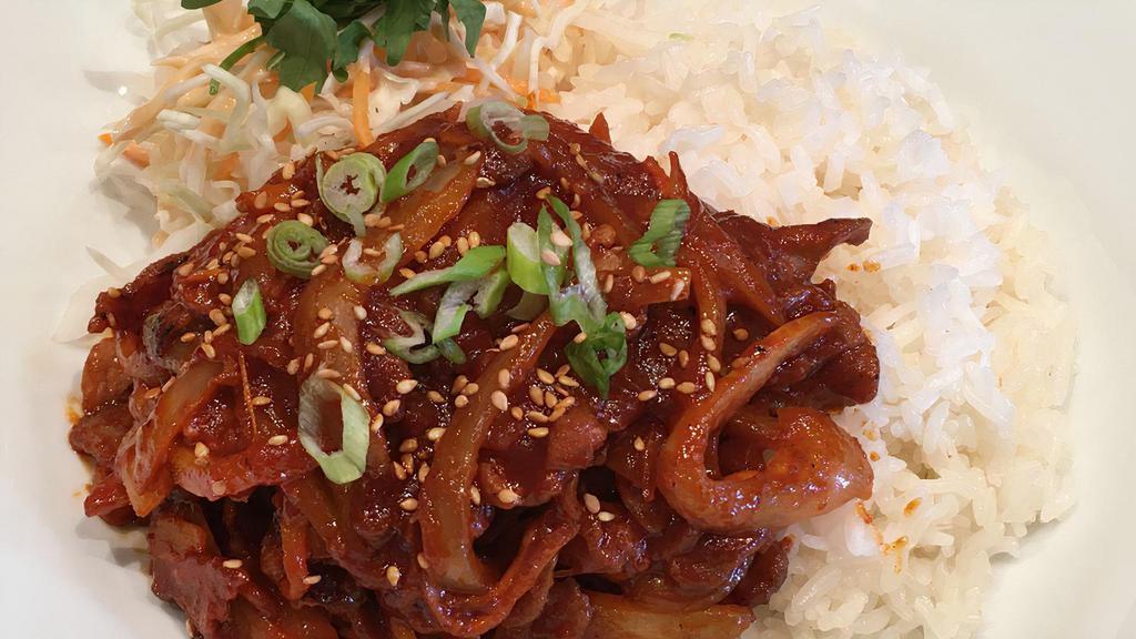 Spicy Pork With Rice · Marinated pork stir fried with vegetables in a spicy marinade.