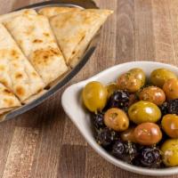 Olive Sampler · Vegetarian.  Assorted Mediterranean olives