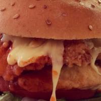 Buffalo Chicken Sandwich · Grilled or breaded all-natural chicken breast, American cheese, caramelized onions, mild buf...