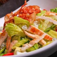 Cobb Salad · Grilled chicken, Romaine lettuce, hard boiled egg, crispy bacon,tomatoes, blue cheese, homem...