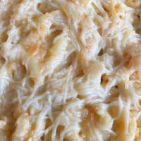 Truffle Mac & Cheese Pasta · Macaroni with truffle oil in a creamy parmesan, cheddar, and Fontina Cheese.