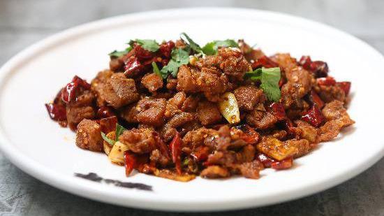 Chongqing Spicy Chicken · Extra hot. Stir-fry diced chicken with Sichuan chili pepper and peppercorn.